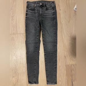 AMERICAN EAGLE distressed black soft knit jeans size: 4